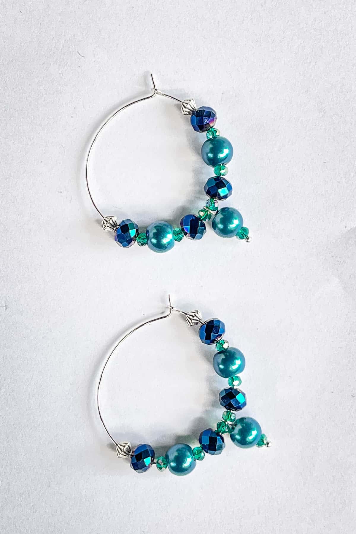 Gorgeous blue and turquoise beaded hoop earrings.