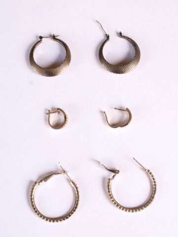 3 pairs of hoop earrings.