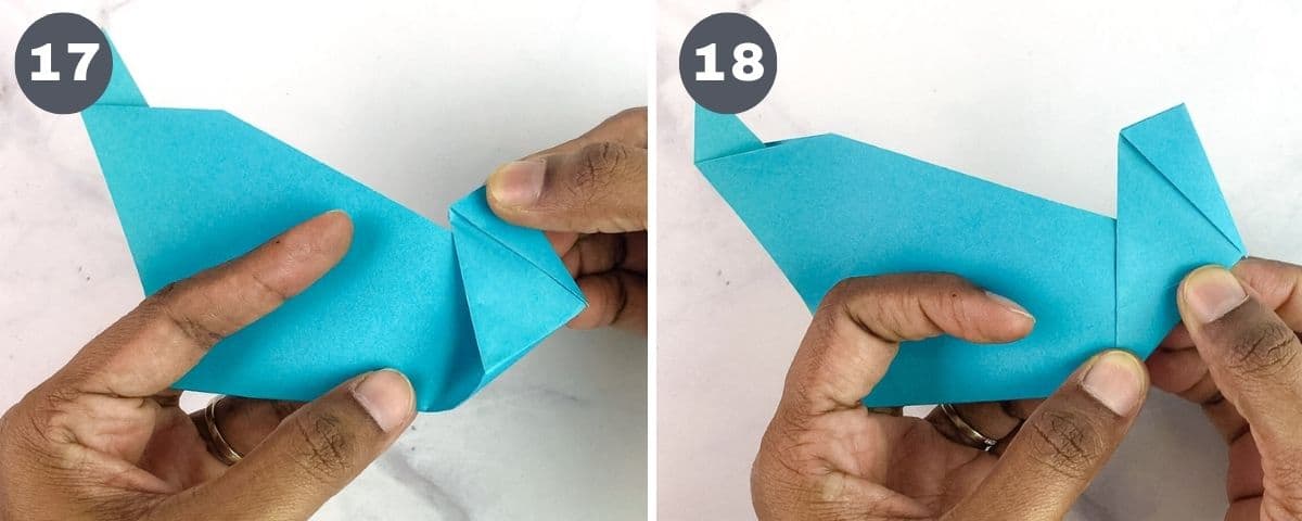 Folding the head and neck of a paper duck.