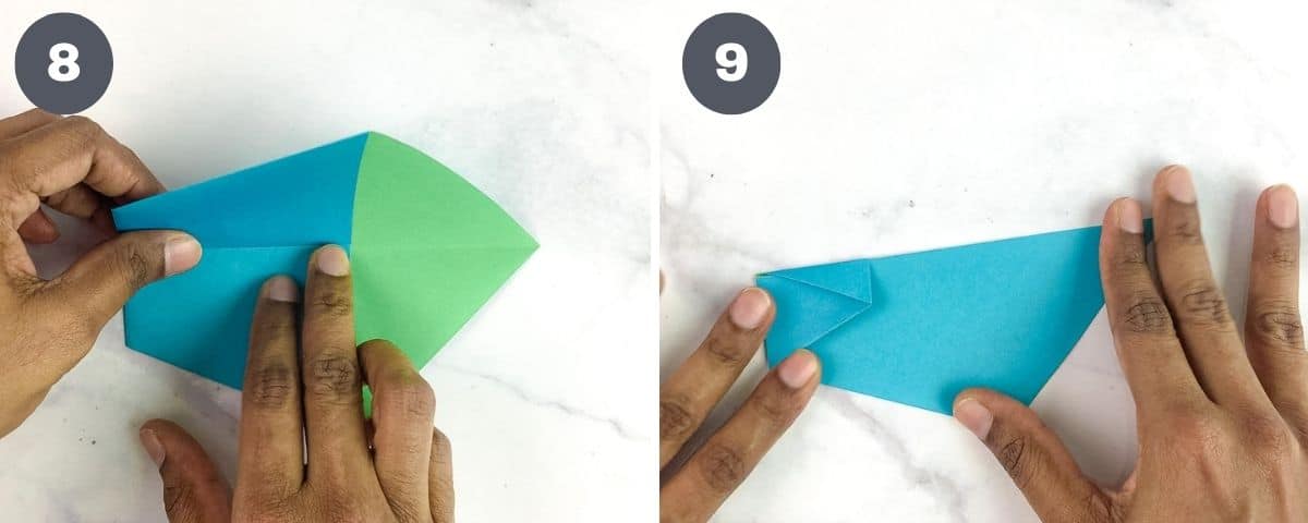 Folding the head of a blue paper duck.