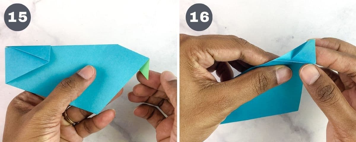 Folding the tail for a blue origami duck.