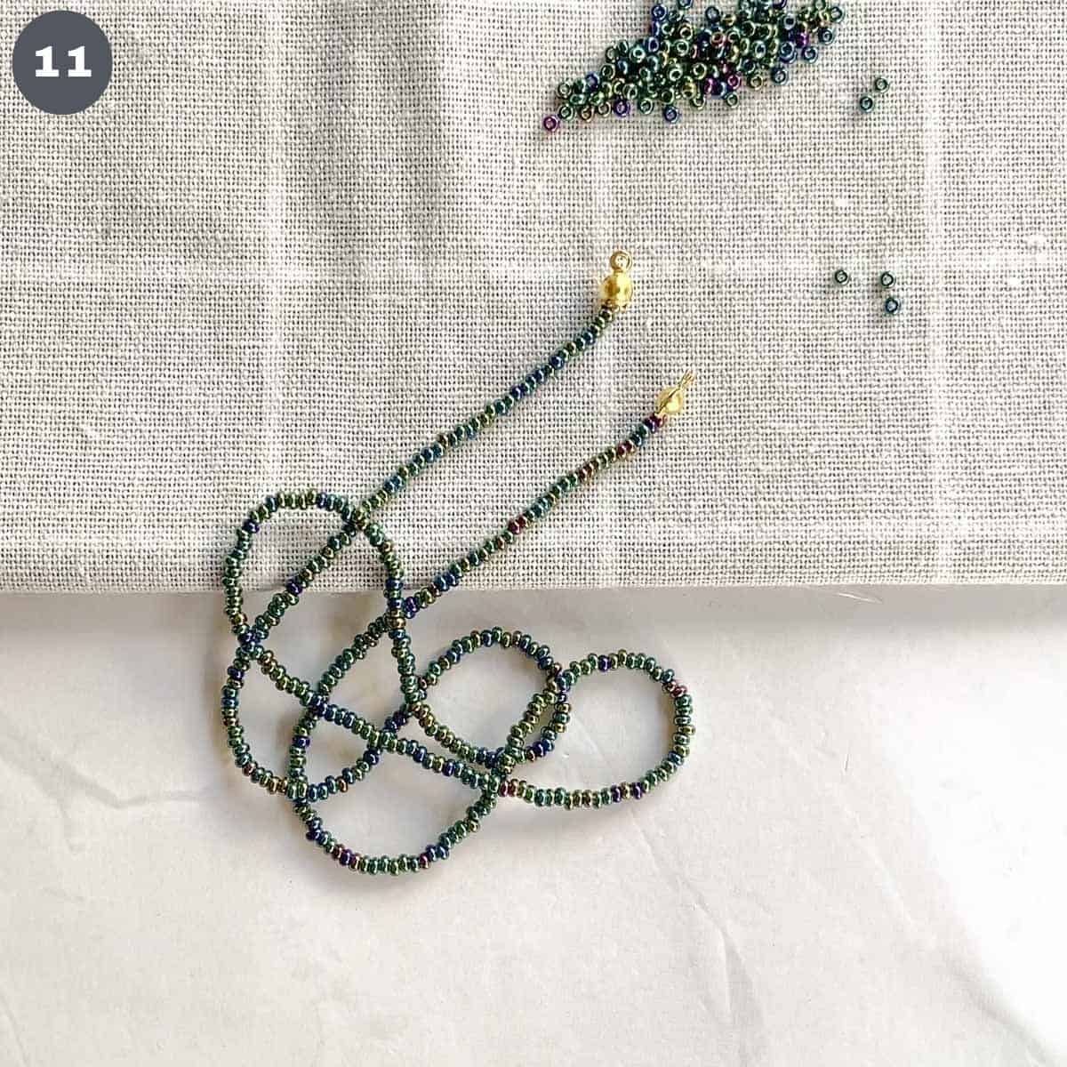 A strand of seed bead necklace.