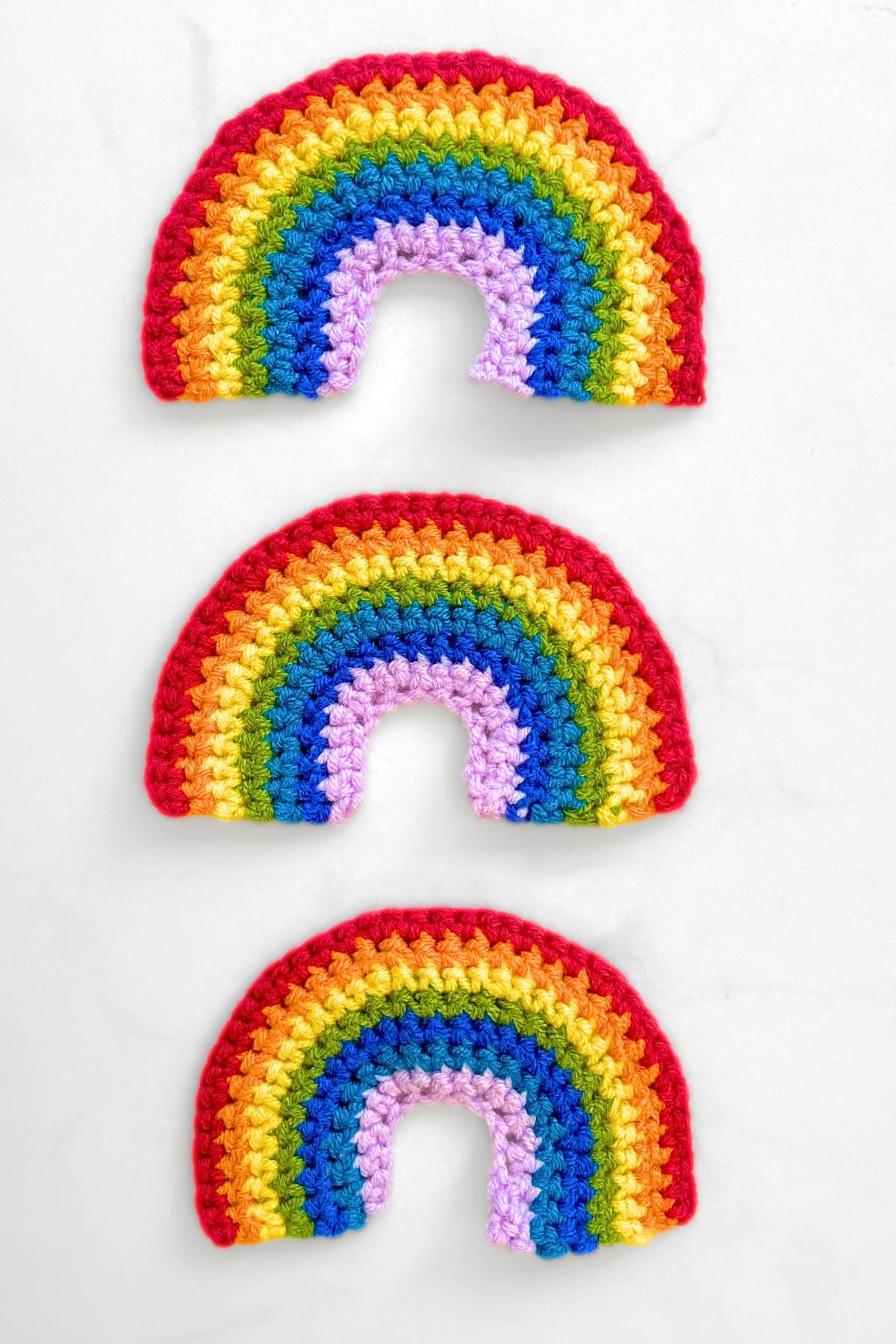 Three crochet rainbows.