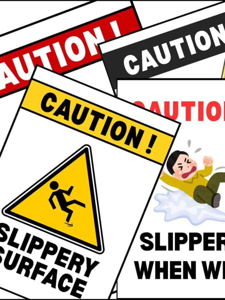 Wet floor signs overlapping on one another.