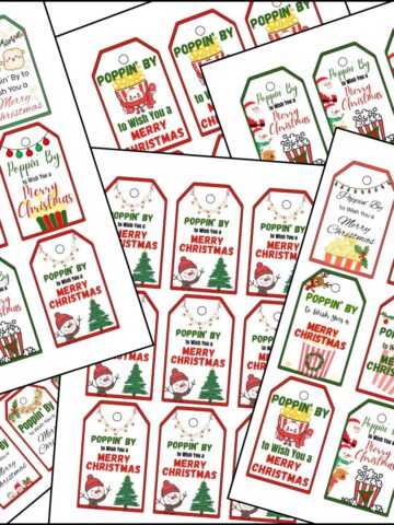 Poppin by to wish you a Merry Christmas printable tags on top of one another.