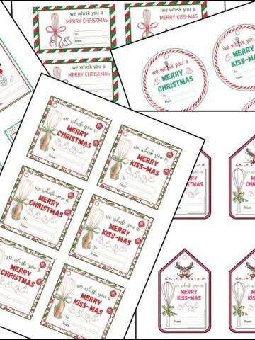 A stack of we whisk you a merry Christmas printable tags overlapping on one another.