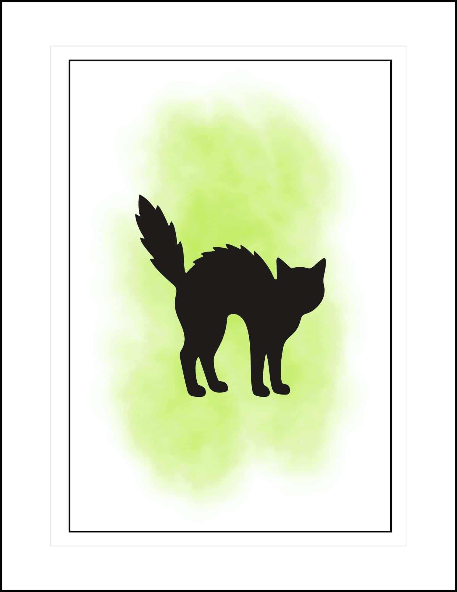 A cat in black silhouette against green watercolor background Halloween card.